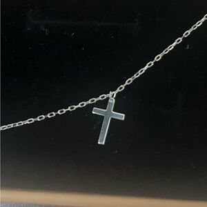 small cross necklace

sterling silver
1" cross, affixed
18" chain